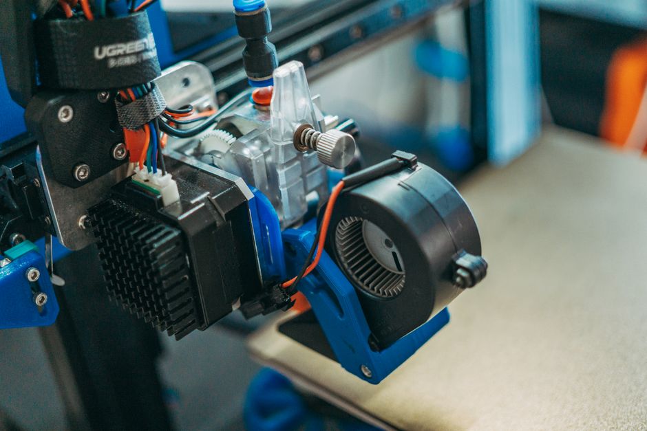 A DIY 3D printer enclosure in a workshop setting