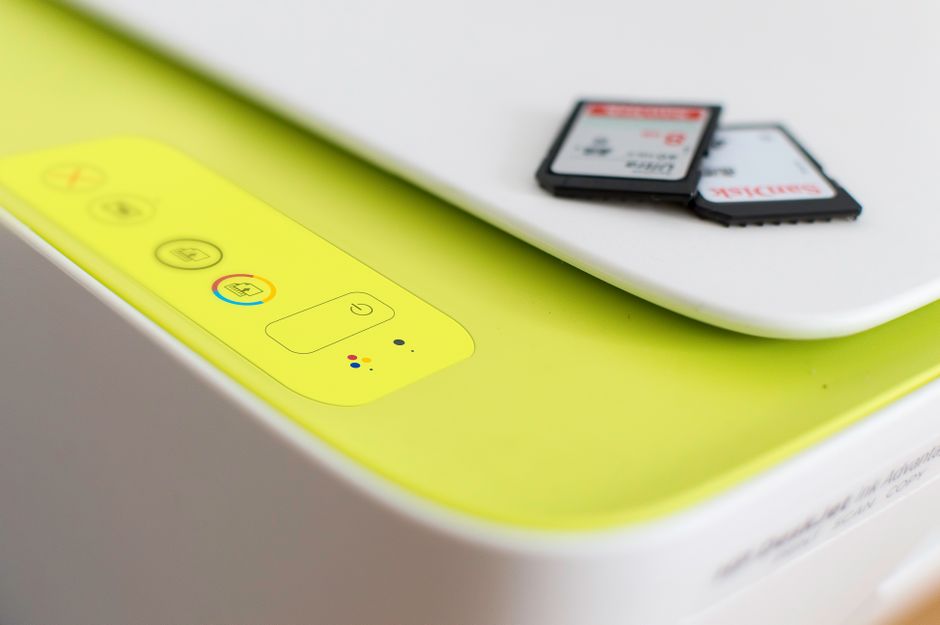 Where Is the WPS PIN on an HP Printer? A Complete Setup & Troubleshooting Guide 1 HP printer control panel showing wireless button and information button being pressed simultaneously